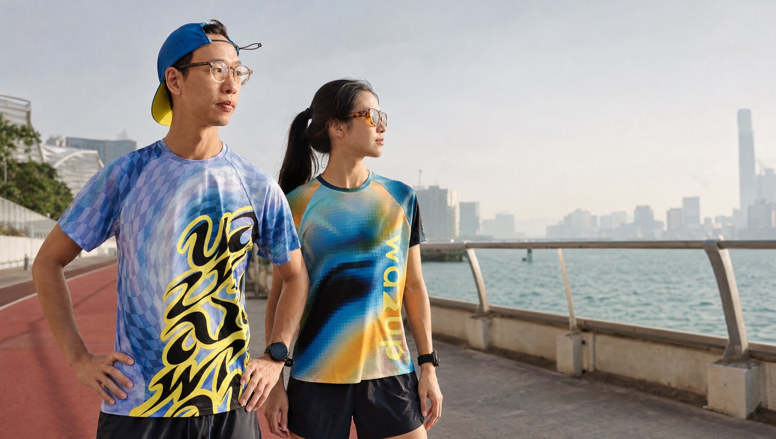 Wazup runners wearing FLOW tees by Hong Kong waterfront